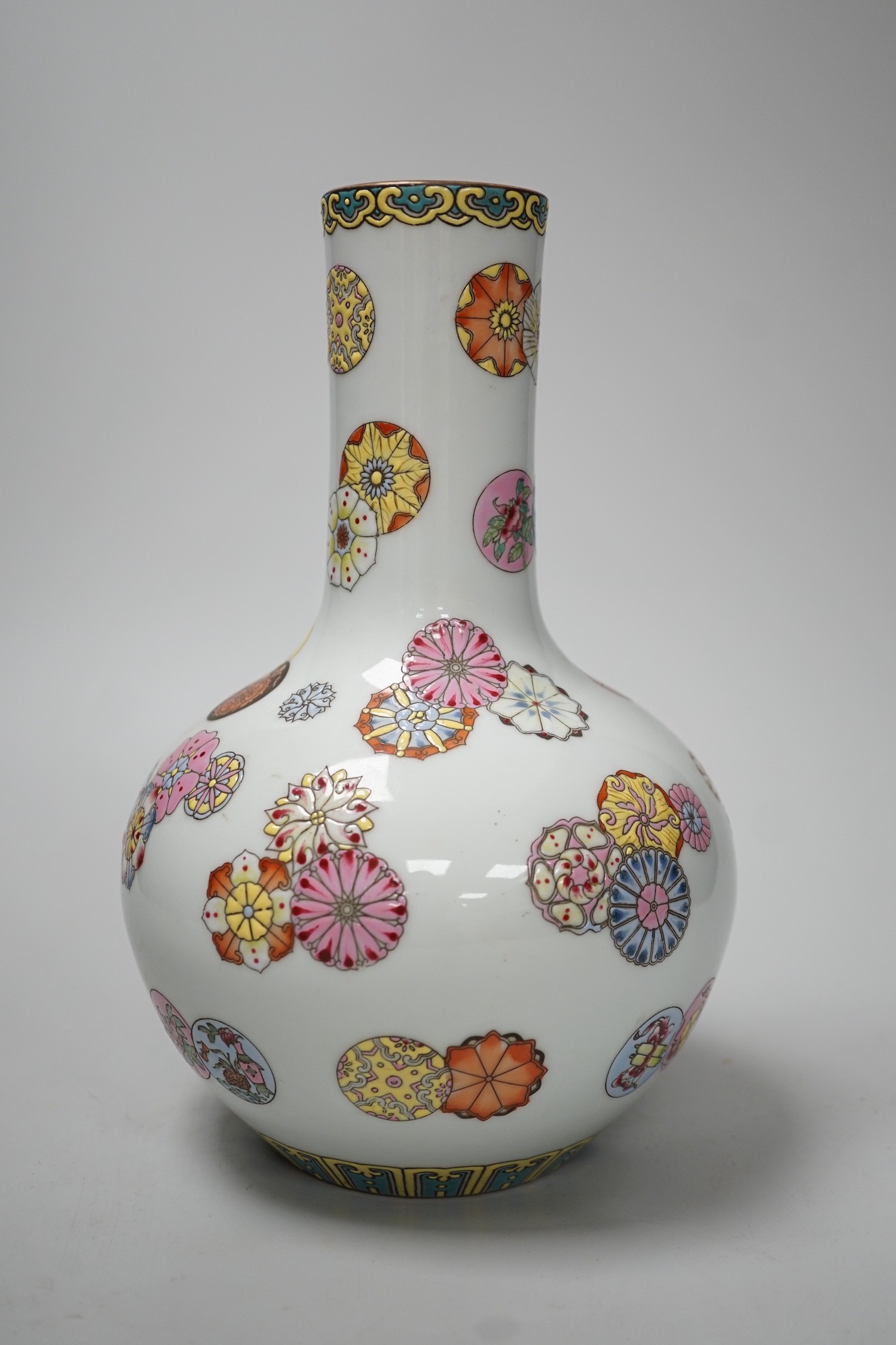 A Chinese famille rose bottle vase, 23cm